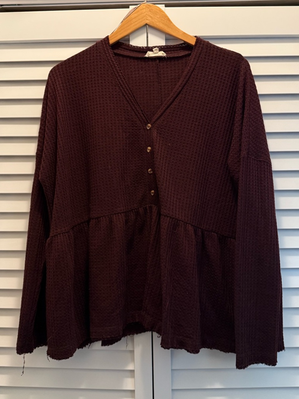 In Bloom Textured Knit Peplum Top - Deep Wine